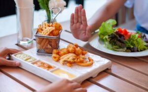 Read more about the article Foods to Avoid During Menopause: A Guide to Successful Weight Loss