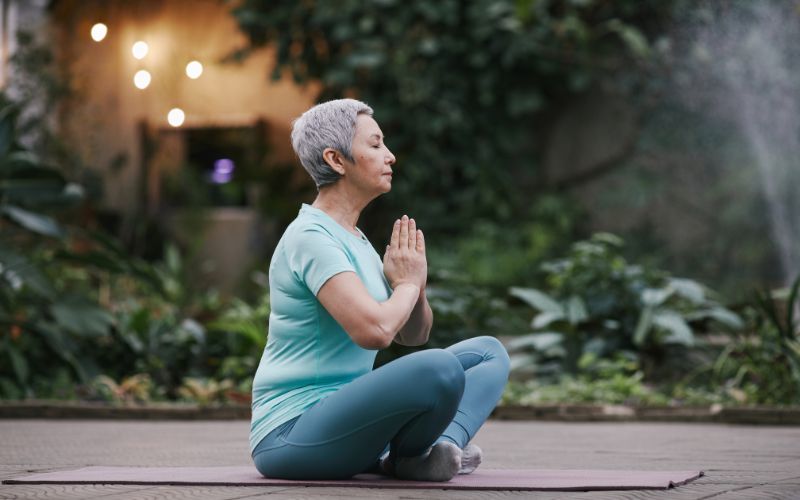 Best Exercise for Menopause: Effective Workouts to Support Weight Loss 4 Woman practicing yoga or Pilates in a serene environment : best exercise for menopause